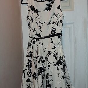 Sleeveless White Dress with Black Floral Print and Belt